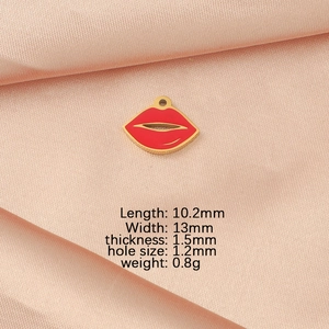 Detail view of red lip pendant with size specs: 10.2mm x 13mm stainless steel accessory