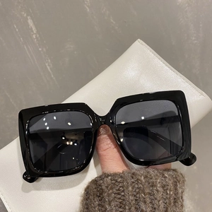 Oversized square black sunglasses with dark lenses for women, stylish vintage frames