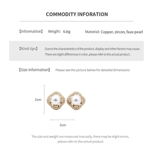 Detail view of pearl earrings with zircon cluster settings and copper material specs