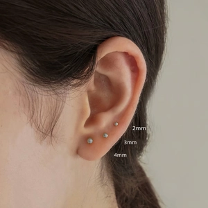 Detailed view of 2mm, 3mm, and 4mm S925 sterling silver ball stud earring set on ear