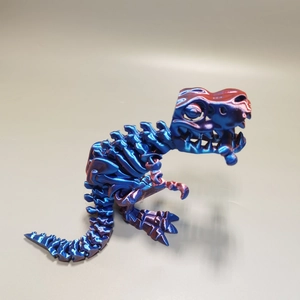 Detail of 3D printed T-Rex skull with iridescent blue and purple chameleon effect finish