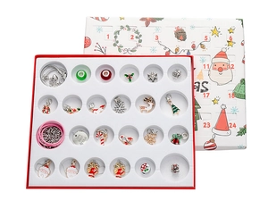 Macro view of Christmas advent calendar box with 24 jewelry charms and bracelets