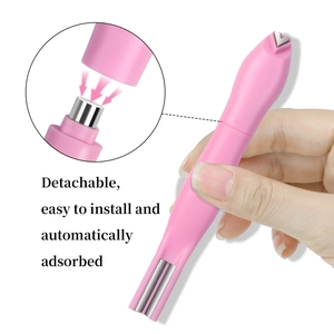 Pink magnetic nail art tool with heart tip and detachable segments for cat eye effects