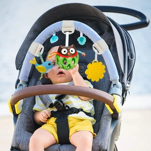 Infant stroller arch with colorful owl and bird plush toys for newborn sensory play