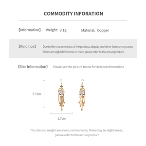 Detailed spec chart of vintage gold-plated flower tassel earrings with copper material info