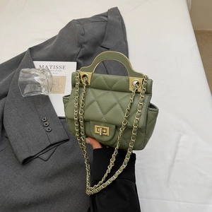 Elegant sage green quilted leather handbag with gold chain strap and rotary lock