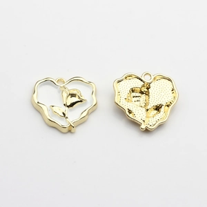 Detailed front and back view of gold heart charms with white rose enamel inlay