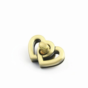 Chiusura girevole in metallo a doppio cuore per borse con finitura in bronzo vintage