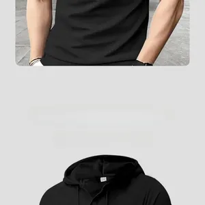 Detail of black waffle knit polo shirt showing breathable mesh fabric and hood texture