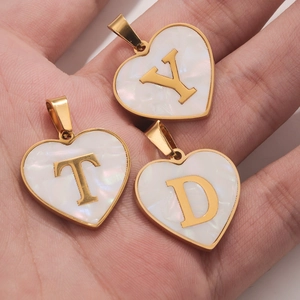 Handheld gold stainless steel heart pendants with white shell inlay and gold letters