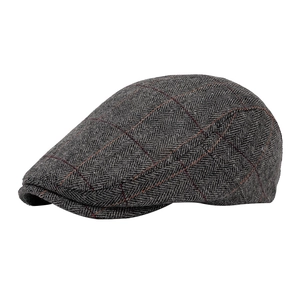 Classic British tweed flat cap with grey herringbone pattern and orange plaid details