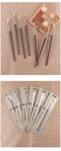 Detailed macro view of 8-piece professional eye makeup brush set with black handles