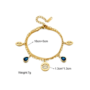 Golden titanium steel double chain bracelet with blue teardrop gemstone and evil eye charm