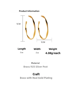 Detail view of wavy twisted gold hoop earrings showing 5cm size and brass material