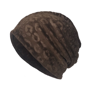 Leopard print plush slouchy beanie hat for women and men in soft warm brown faux fur fabric
