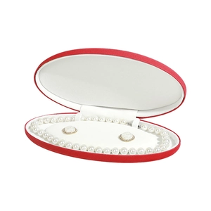 Elegant red oval velvet jewelry box featuring a pearl necklace and matching earrings