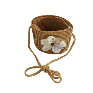 Girl's woven straw crossbody bag with white chiffon flower for summer beach travel