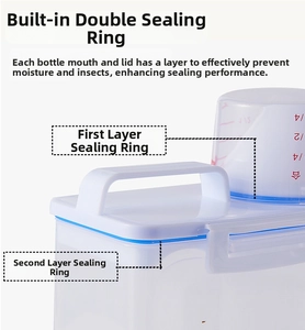 Detail of food storage container with blue double-sealing rings and graduated measuring cup