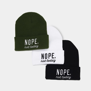 Knitted beanie hat in green, white and black featuring Nope Not Today embroidery