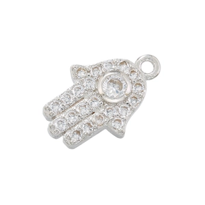 Detailed close-up of a silver Hamsa hand pendant with micro-pave crystal embellishments