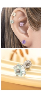 Macro detail of star-cut colorful zircon stud earrings with secure screw-back titanium post