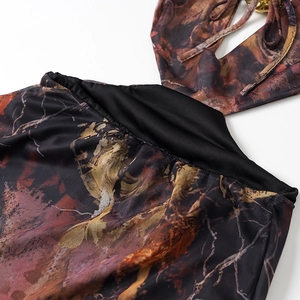 Close-up of abstract printed mesh fabric with gathered texture and fine stitching