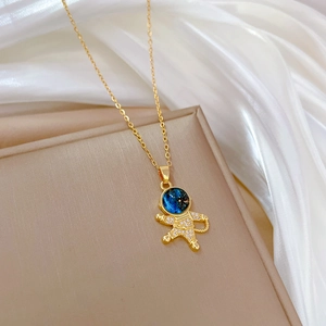 Luxurious gold-plated astronaut pendant necklace with blue starry helmet and crystal pavé