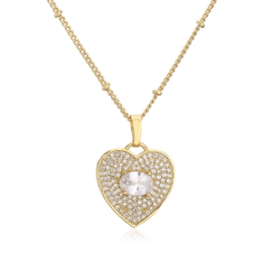 Macro shot of gold-plated heart necklace featuring a micro-paved oval zircon center