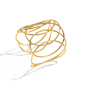 Exaggerated gold multi-layer spiral open cuff bracelet in minimalist geometric style