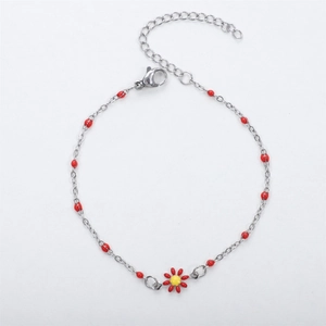 Detail of silver daisy bracelet with red enamel beads and adjustable extension chain