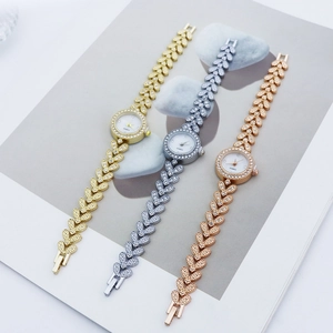 Three elegant rhinestone bracelet watches in gold, silver and rose gold finishes