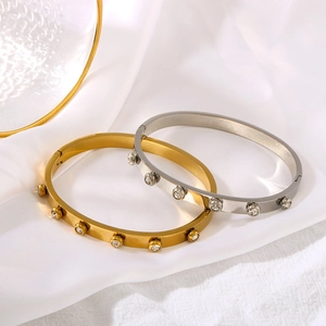 18K gold and silver plated stainless steel bangles with round cubic zirconia stones