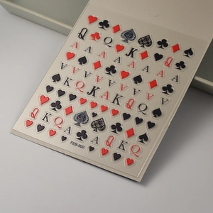 Detail of 5D embossed poker nail stickers showing card suits and 3D relief texture