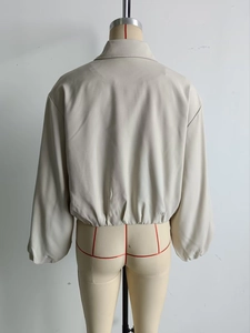 Back view of light beige bomber jacket with dropped shoulders and gathered hem detail