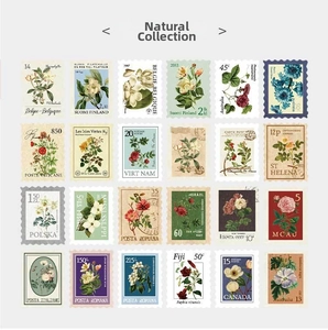 Macro view of vintage botanical stamp stickers with detailed floral and fruit illustrations
