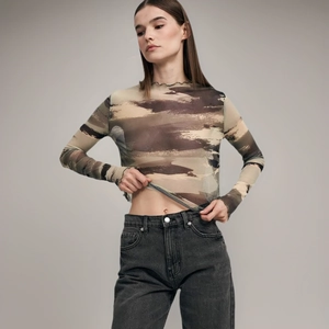 Body sexy da donna in mesh leopardato a maniche lunghe con motivo tie-dye irregolare