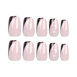 Short square press-on nails with minimalist pink and black heart patterns and French lines