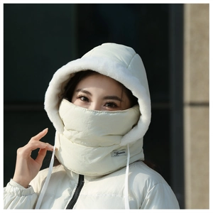 Cozy winter windproof fleece lined hooded scarf and mask worn by a woman outdoors