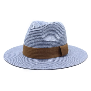 Classic blue woven straw Panama hat for women with a dark brown decorative band and flat brim