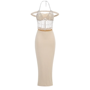 Elegant off-shoulder beaded two-piece set featuring a tassel crop top and fishtail skirt