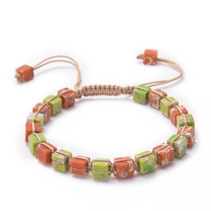 Macro view of Bohemian woven bracelet featuring colorful square natural stones and cord