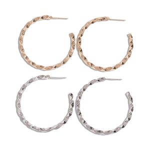 Geometric C-shape twisted hoop earrings in rose gold and silver with diamond-cut texture