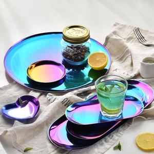 Rainbow stainless steel trays in round, oval, and heart shapes for jewelry storage