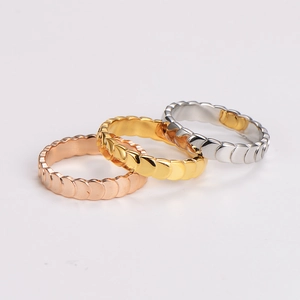 Three-piece stainless steel ring set with mermaid scale texture in gold, silver, and rose gold