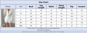 Size chart detail for elegant white jacquard blazer and shorts set with measurements
