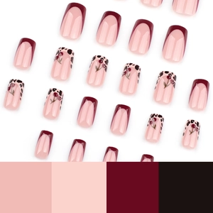 Faux ongles rouges à pression avec motif léopard et cerise sur fond blanc pur