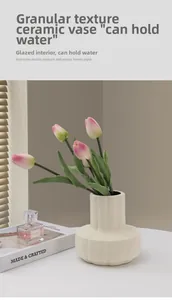 Detail of cream ceramic vase showing matte grain texture and waterproof glazed interior