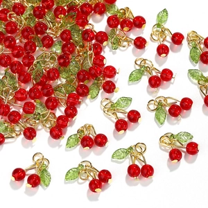 3D cherry fruit charms for DIY jewelry making with red beads and green leaves