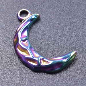 Macro shot of iridescent rainbow moon pendant with hammered texture and integrated ring hook