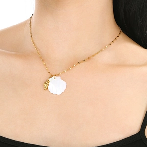 18K gold plated stainless steel necklace with shell pendants on a female model